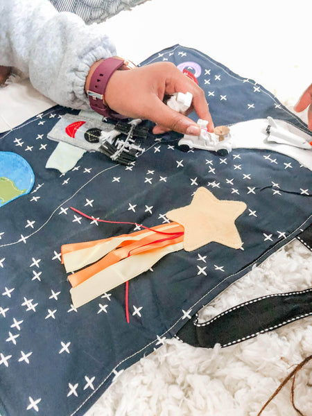 Pretend Play Sets - kids' hand playing with space toys - Mouse Loves Pig